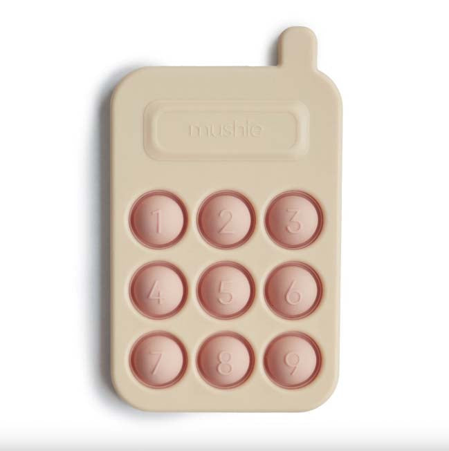 Mushie : Jouet à presser en forme de téléphone "Blush"