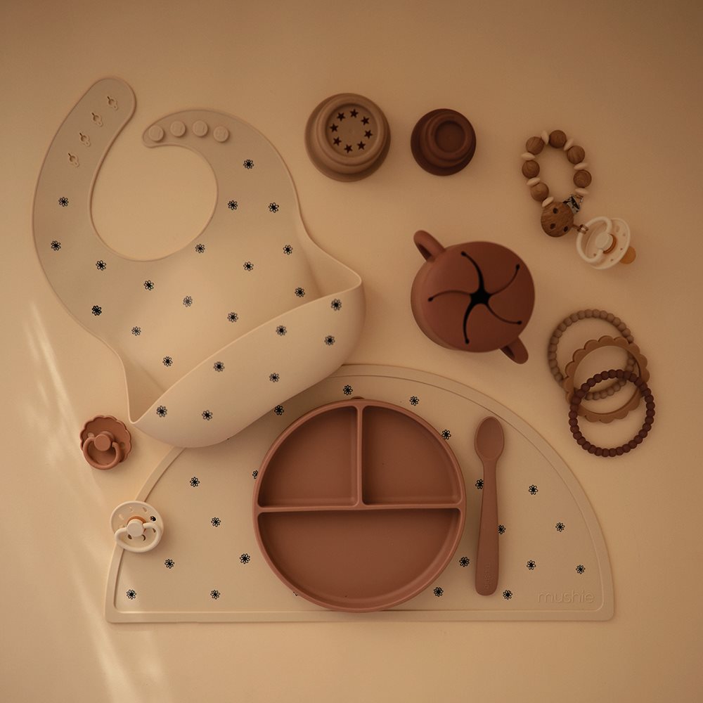 Mushie : Set de table en silicone "Black Daisy"